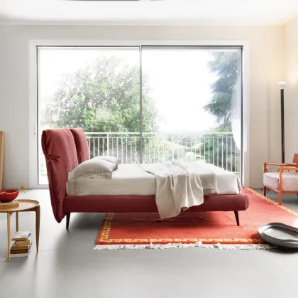 Letto imbottito Eden Advance con fiocchi sulla testiera in tessuto di Noctis