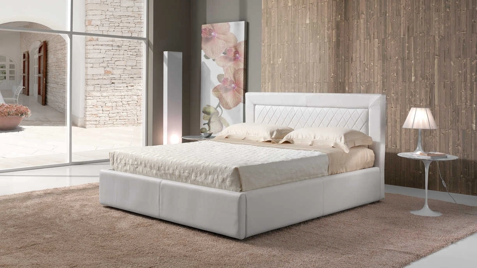 Letto in pelle con testiera Giada di Tancredi salotti