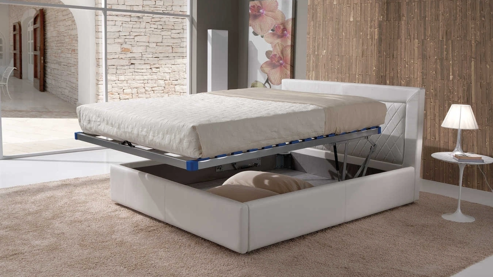 Letto in pelle con testiera e box contenitore Giada di Tancredi salotti