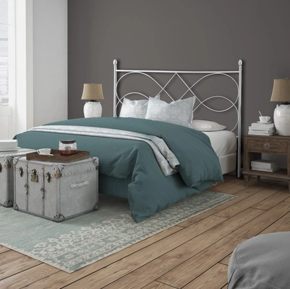 Letto Sospiro con testiera in ferro battuto e giroletto in tessuto imbottito di Florentiabed