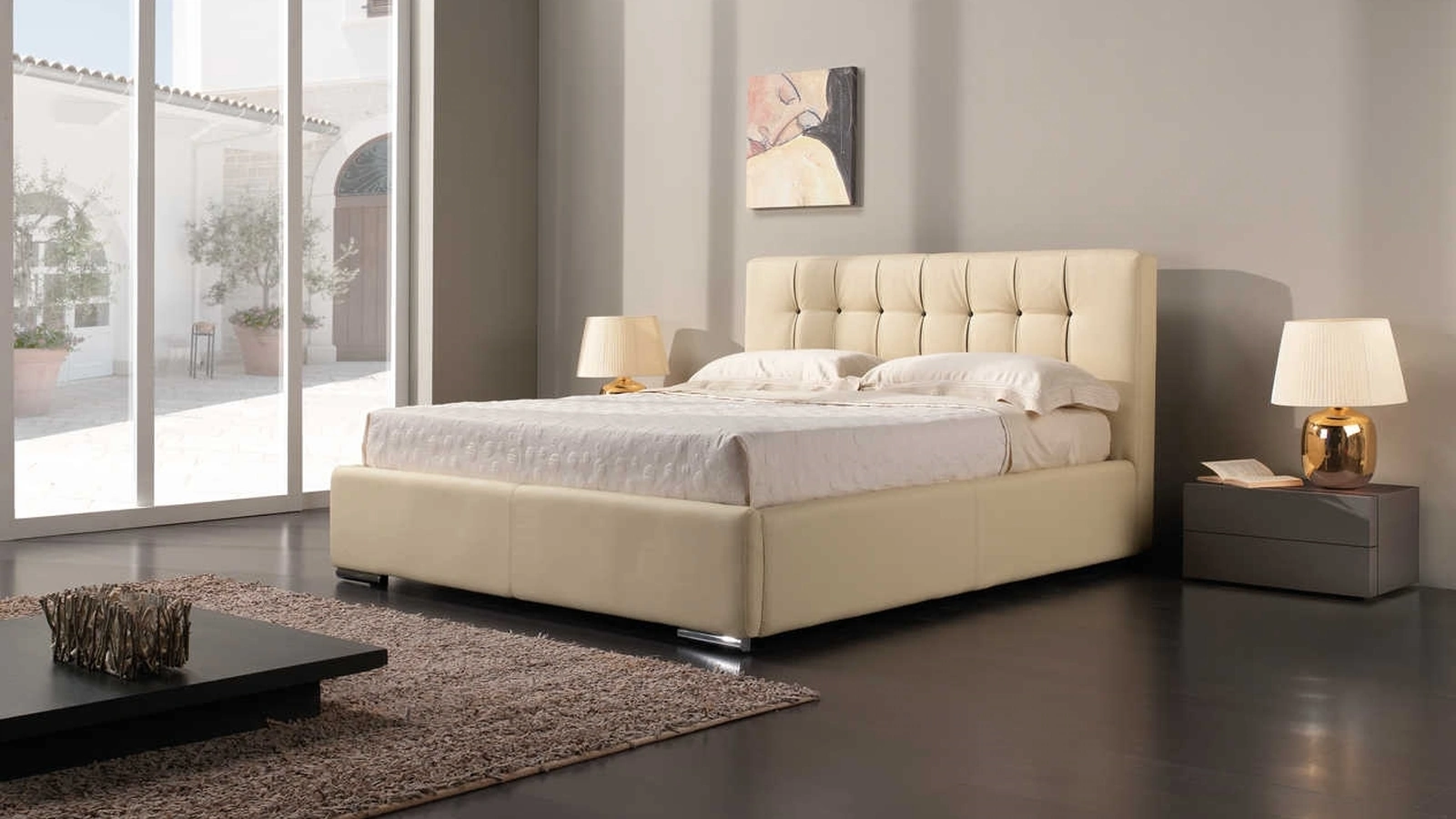 Letto in pelle imbottito con testiera trapuntata Incanto di Tancredi salotti