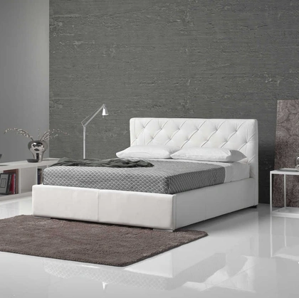 Letto in pelle imbottito con testiera trapuntata Nemo di Tancredi salotti