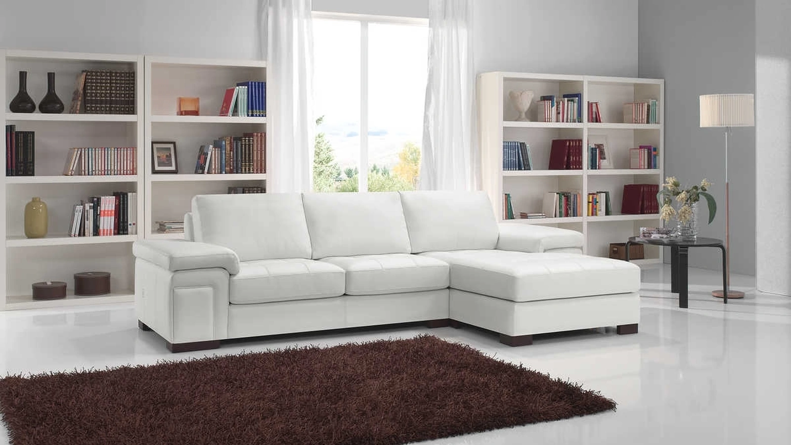 Divano in pelle con penisola Amalfi di Tancredi salotti