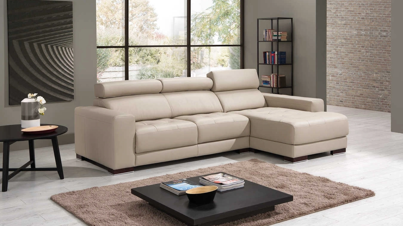 Divano in pelle con penisola Sliding di Tancredi salotti